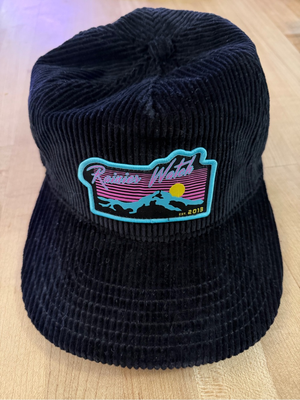 Black Corduroy Patch Cap with Teal, Pink and Yellow Graphic